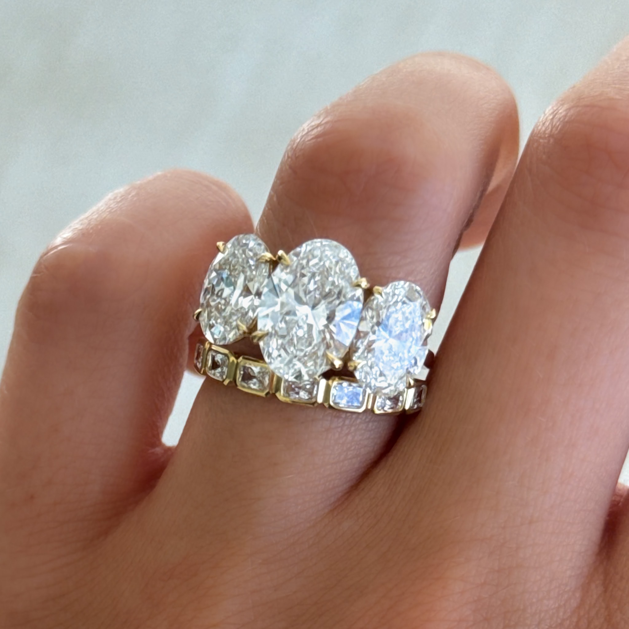 Triad Engagement Ring With Oval Cut Diamonds