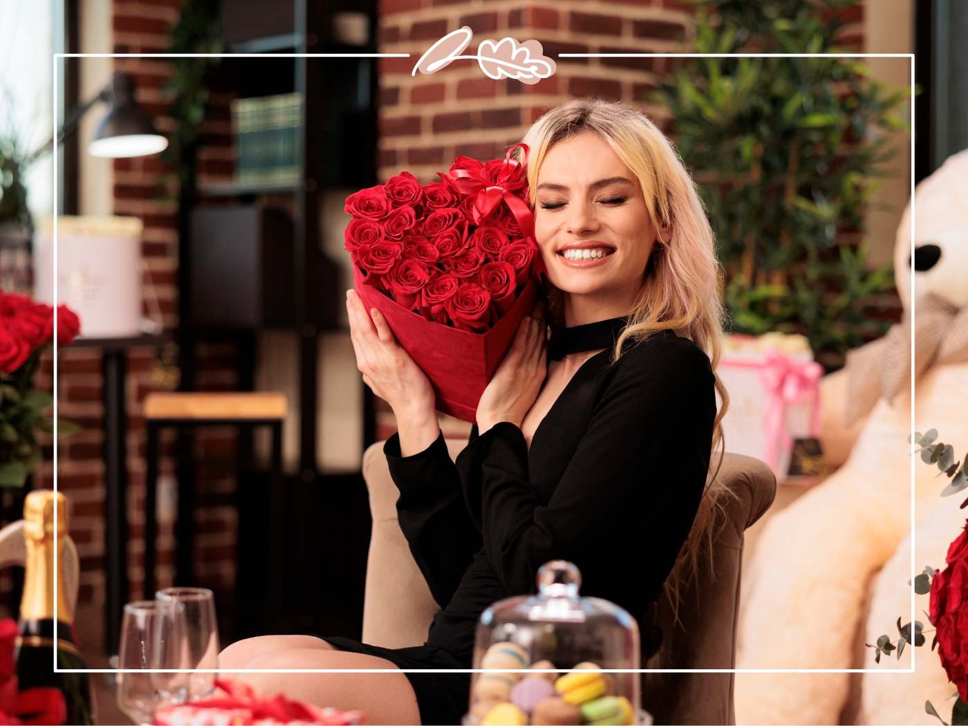 A vibrant mixed flower bouquet featuring red roses, elegant lilies, and lush greenery is arranged in a clear glass vase, making it a perfect Valentine's Day gift to celebrate love and affection for a special someone. This beautiful floral arrangement is ideal for surprising a loved one on a romantic date night or as a delightful delivery to brighten their day.