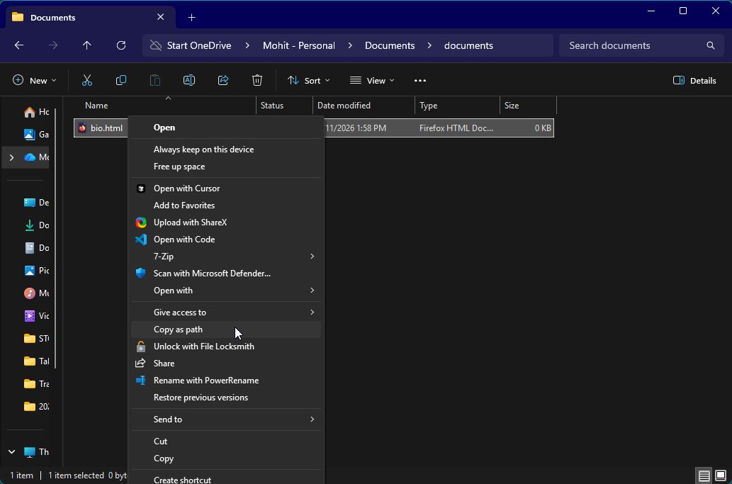 Right click the file and click copy as path.