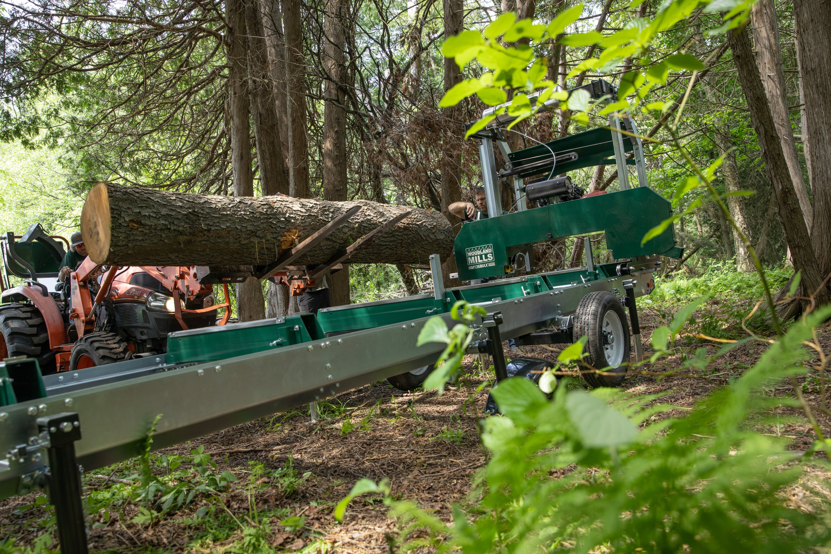 A portable sawmill used to clear land for site preparation.