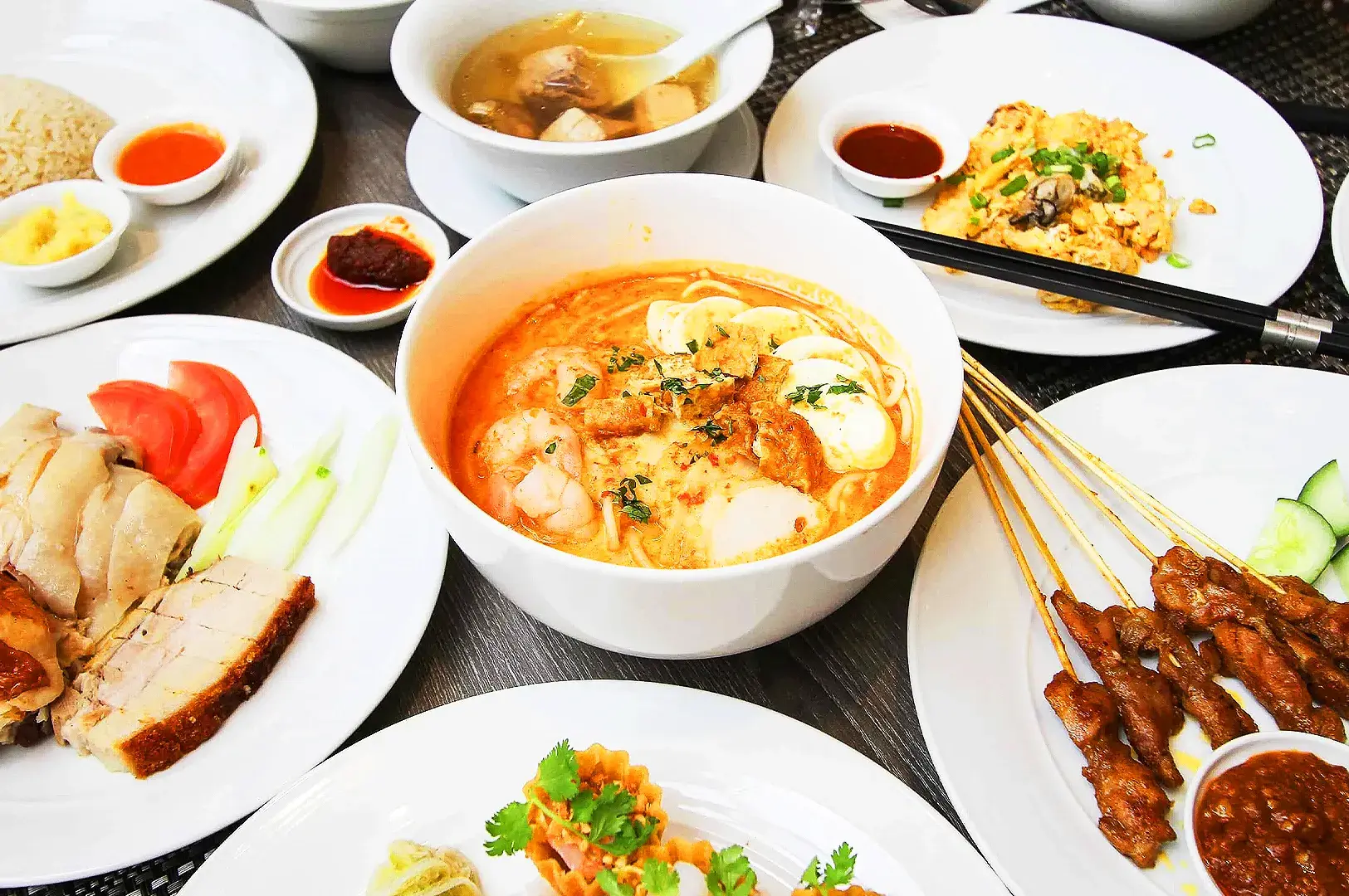 Singapore buffet featuring laksa, satay, Hainanese chicken rice and local Singaporean dishes
