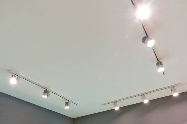 Magnetic track light systems installed in a room. 