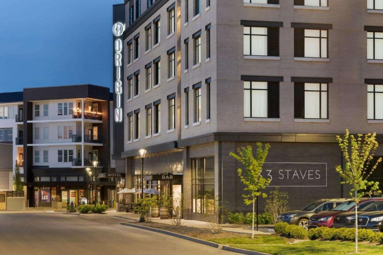 A beautiful exterior evening view of Origin Lexington – A Wyndham Hotel