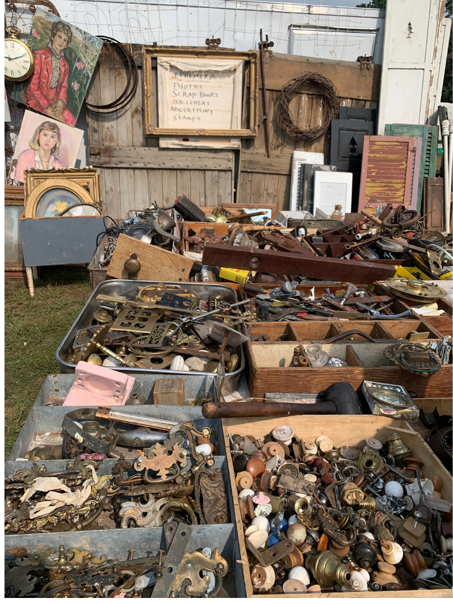 Assortment of antique and vintage hardware at a flea market