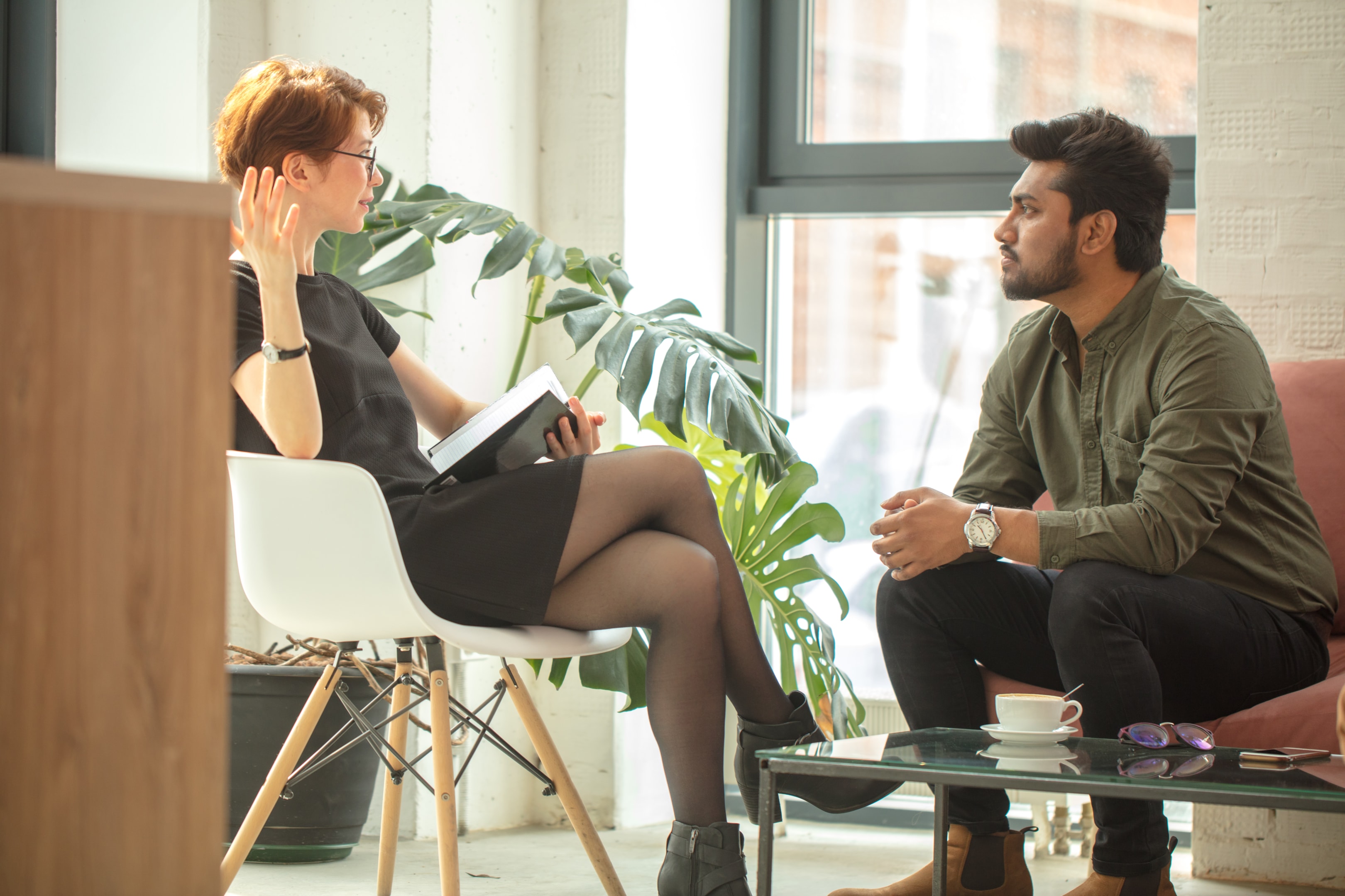 Image of schema therapist using limited reparenting strategies to help a client suffering from depression and the defectiveness schema.