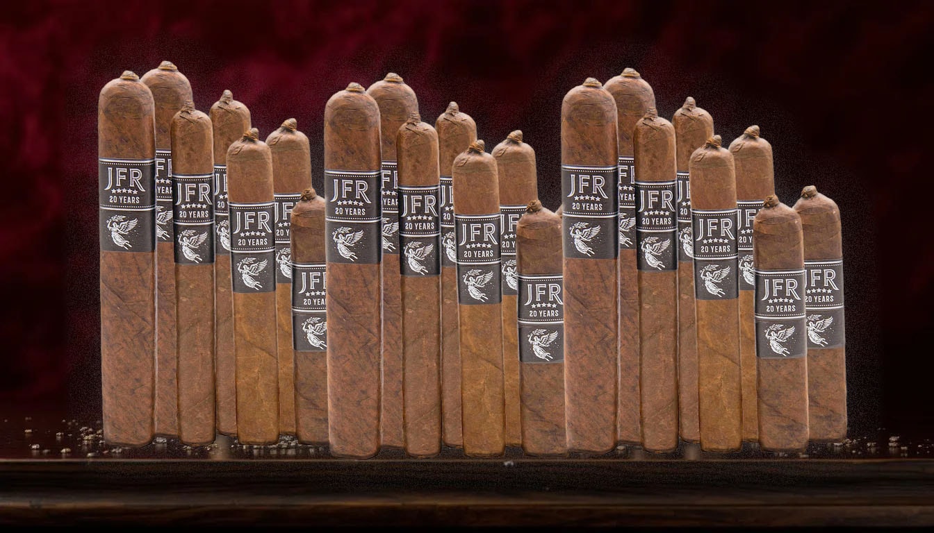 A collection of premium cigars including the JFR 20th Anniversary Maduro, showcasing their craftsmanship.