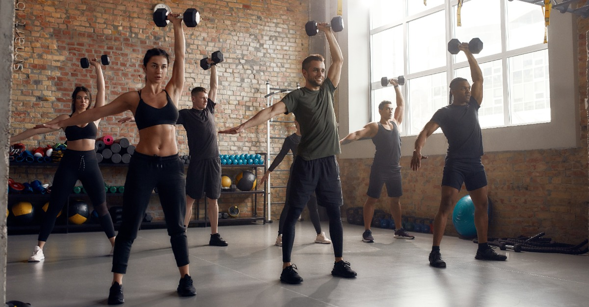 A group of people working out in a gym
