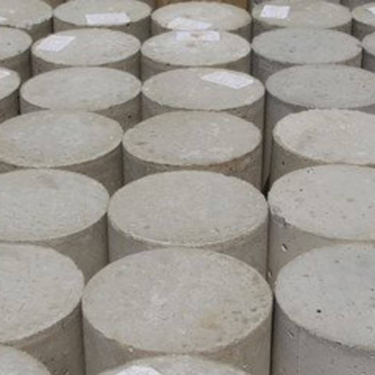 Preparation of concrete cylinders for compressive strength testing