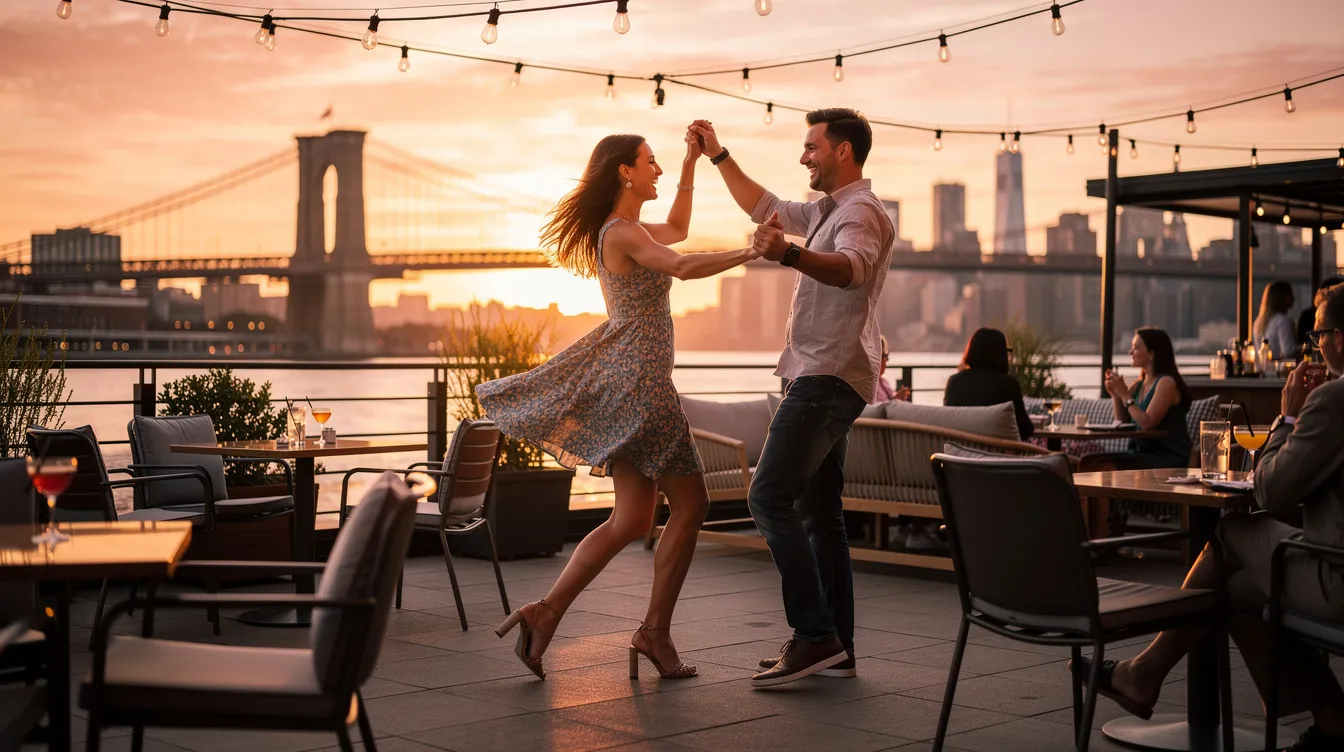 A couple is joyfully dancing on a rooftop bar in New York City during a vibrant sunset, with the iconic Brooklyn Bridge silhouetted in the background. This scene captures the essence of the NYC dating scene, where meaningful connections and shared experiences flourish amidst the city's fast-paced atmosphere.