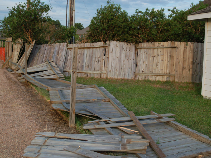 An image showing various types of fence damage caused by Arizona's climate.