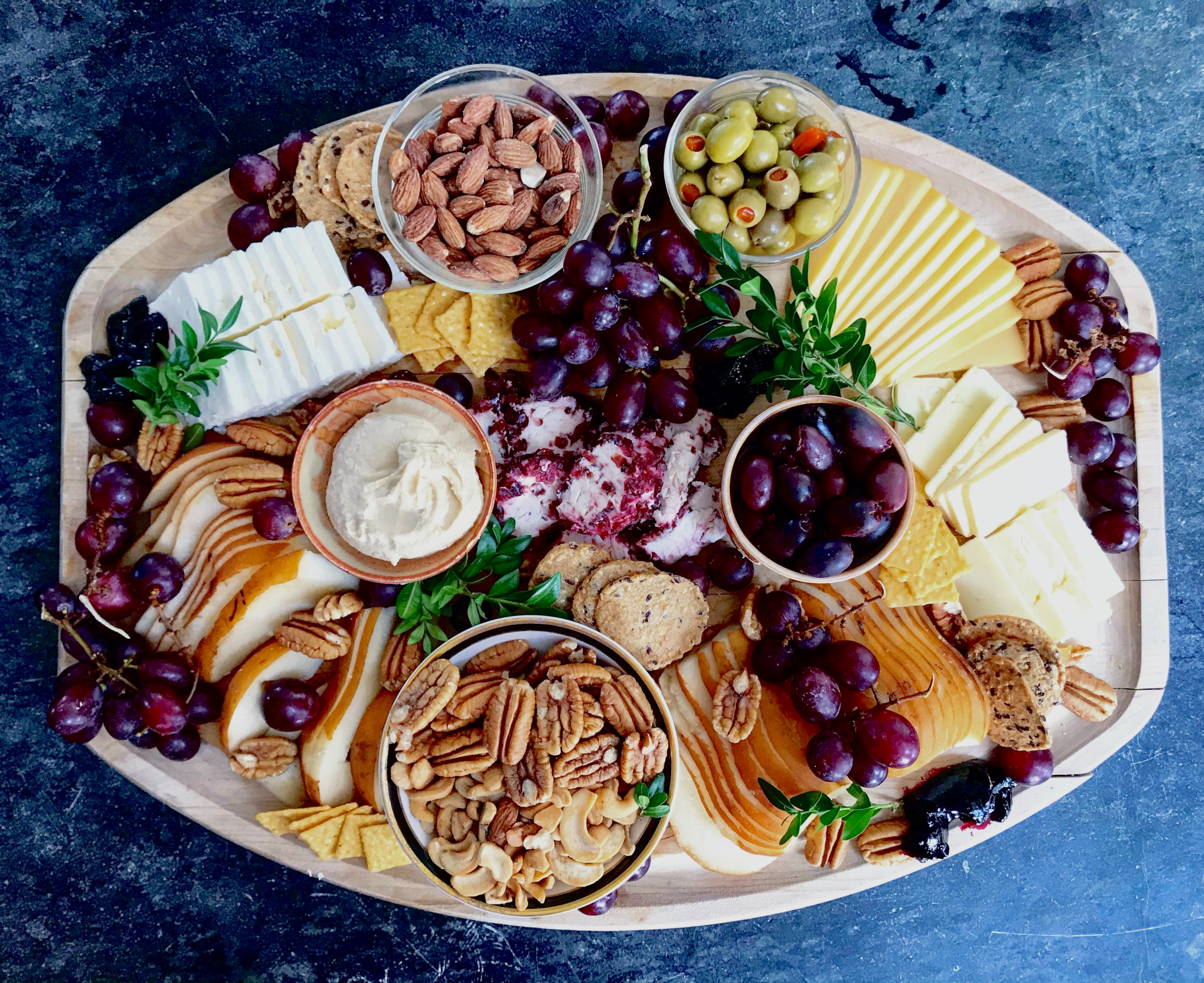 Plate of appetizers. Photo by Liz Joseph on Unsplash