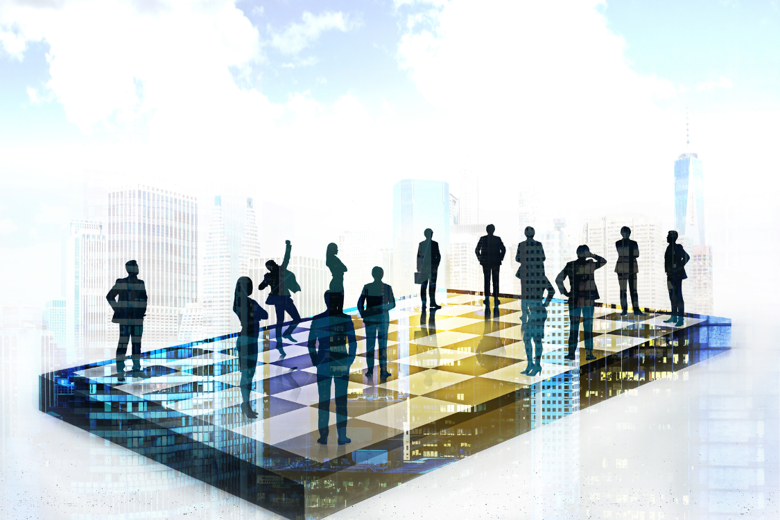 Silhouettes of businesspeople standing on a large chessboard over a city skyline, symbolizing strategic buyer positioning