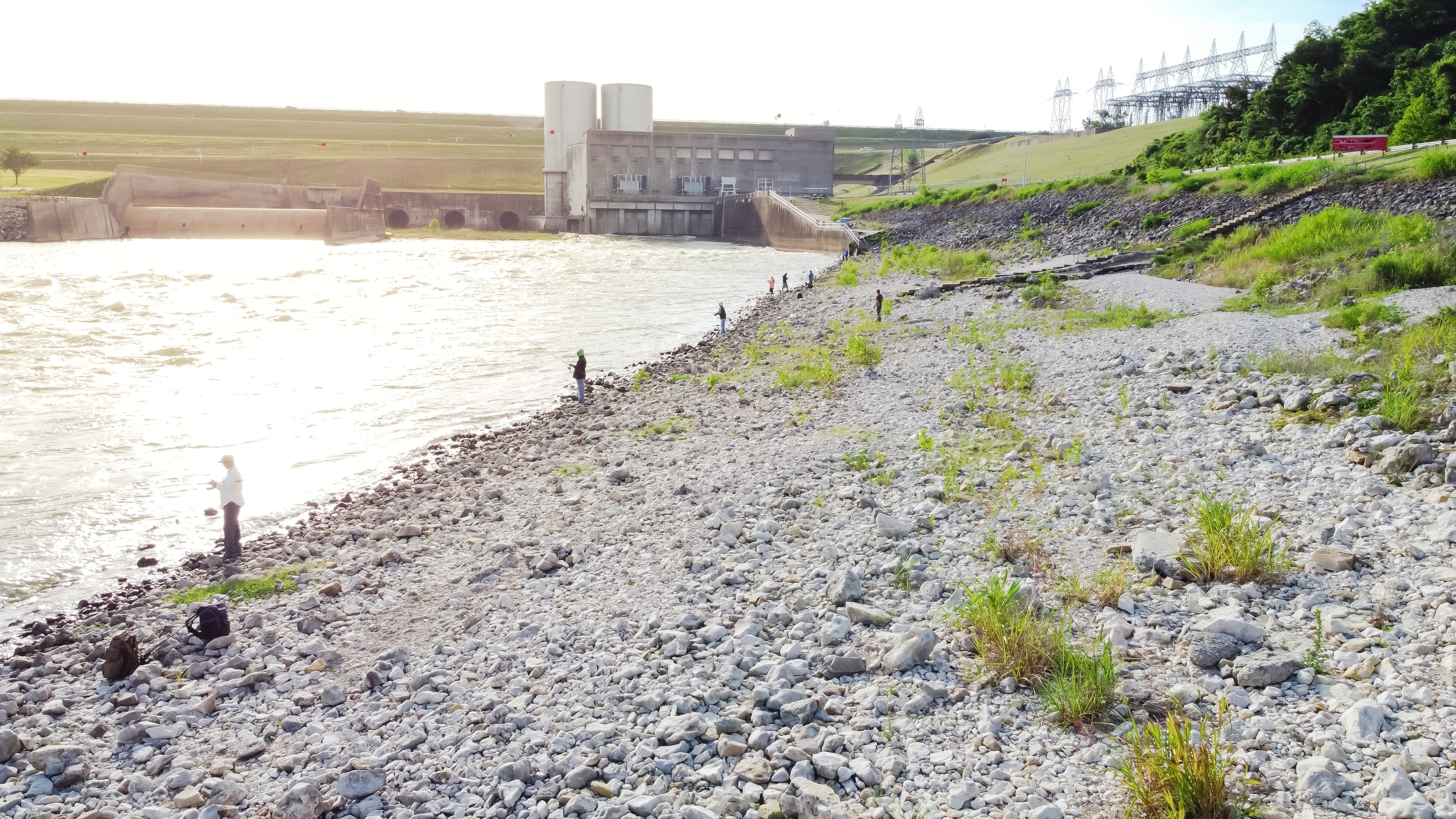 Denison Dam with Fisherman, easy access to the shoreline.