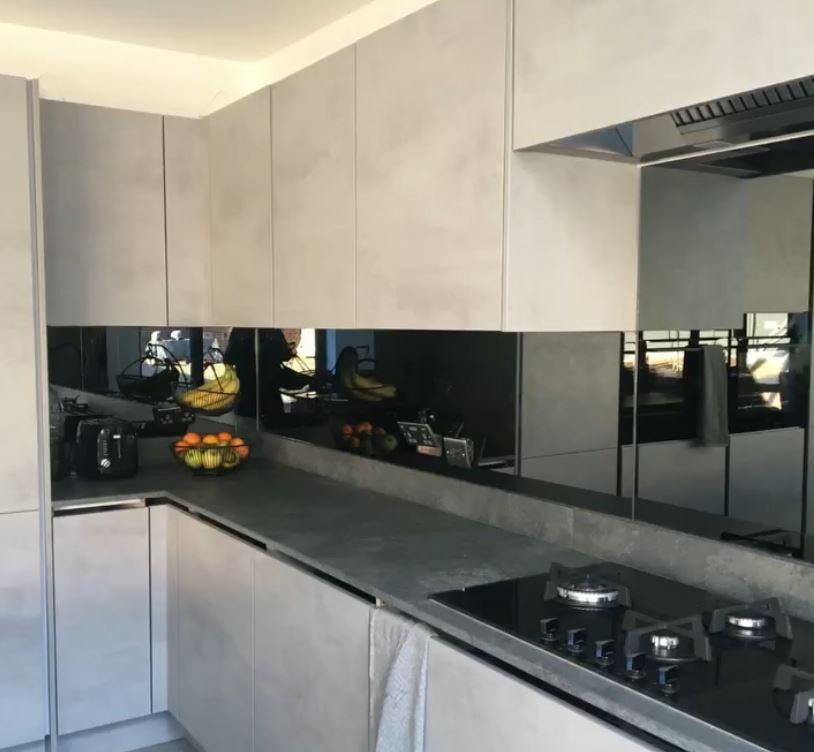 grey mirror backsplash
