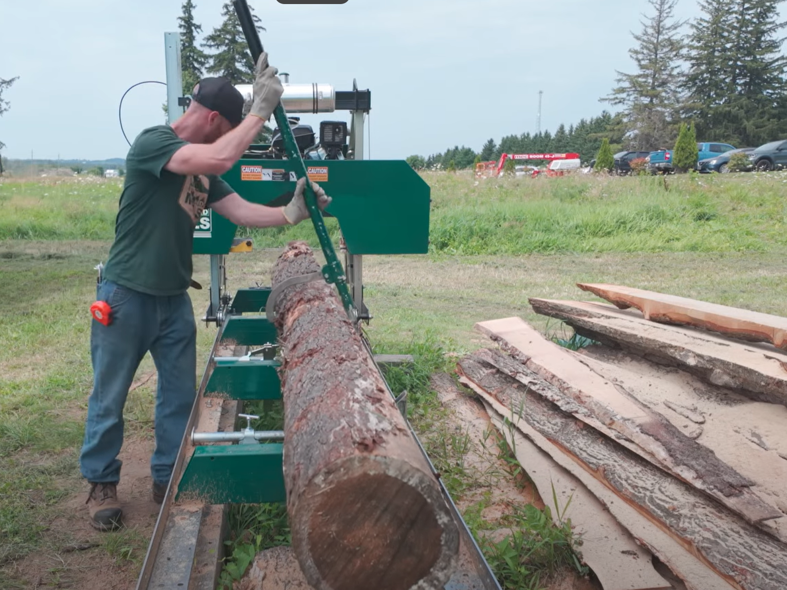 The log being flipped over for the second cut. 
