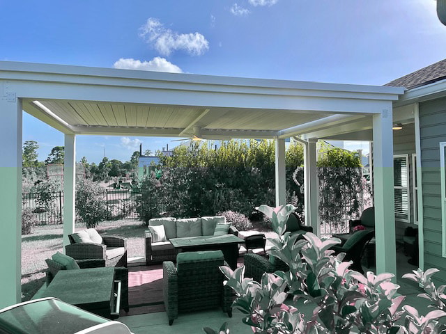 Many luxury patio designs have added landscape and greenery for a more beautiful space.