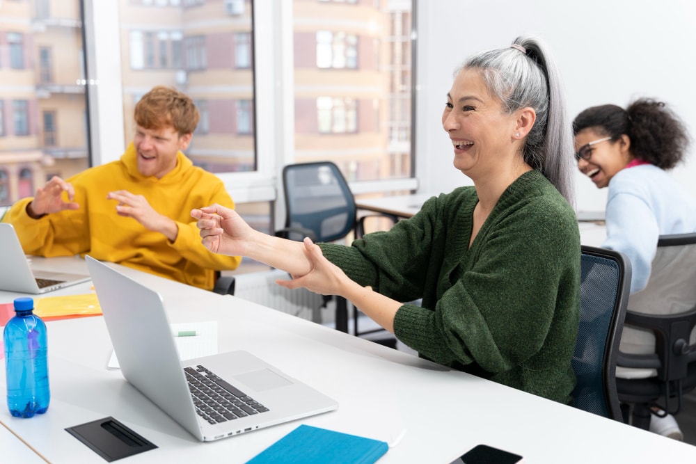 colleagues smiling in the office