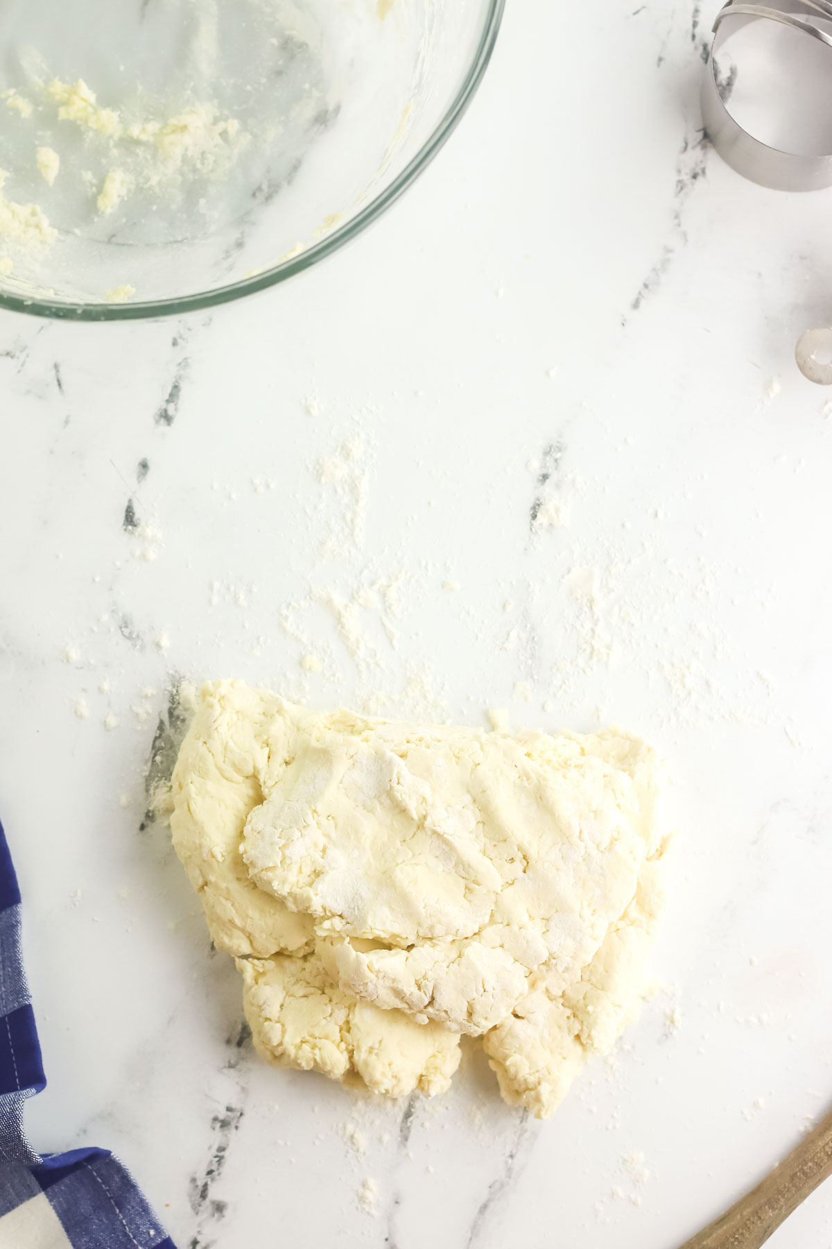 biscuit dough being folded in half