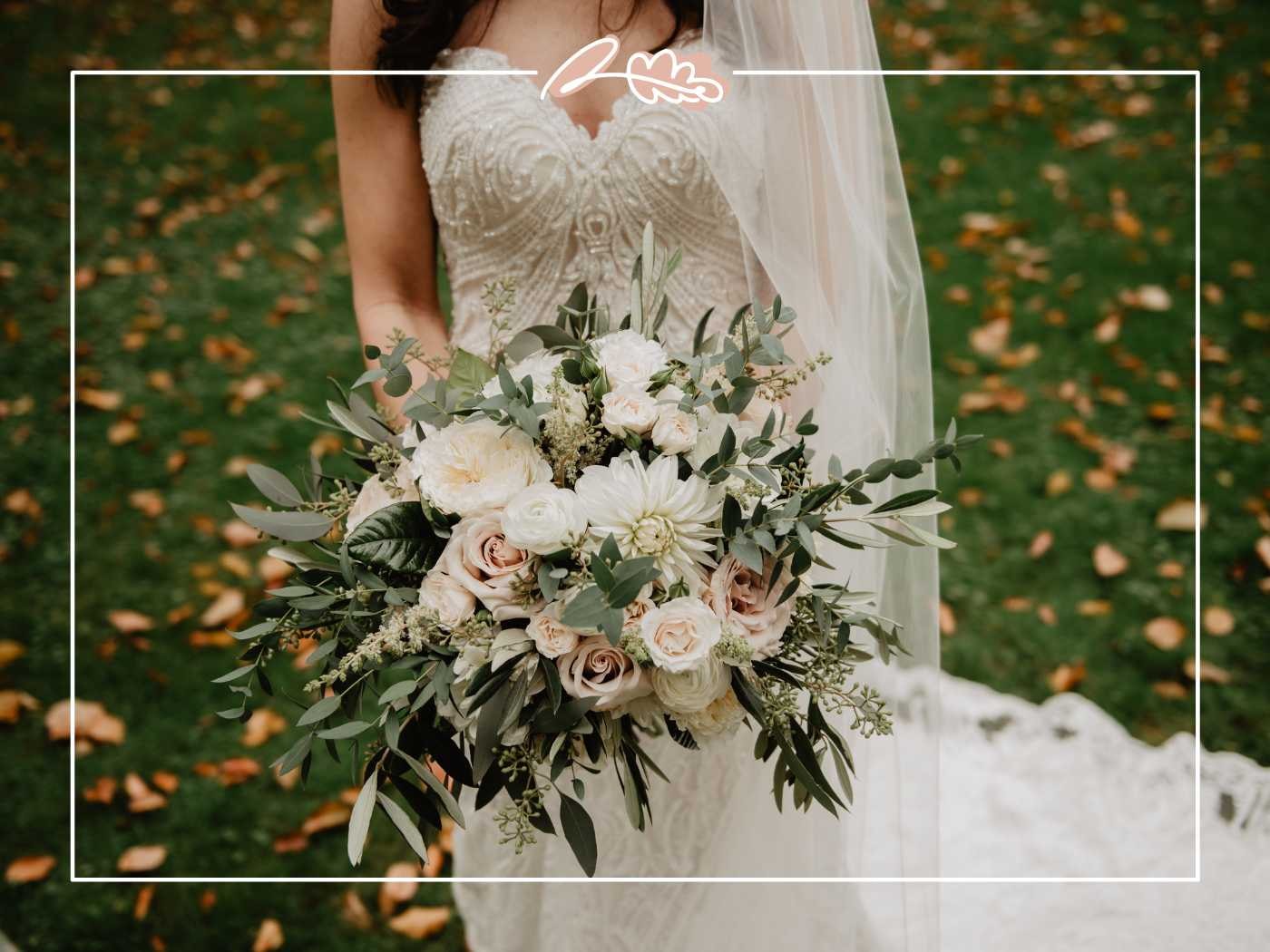 The bride standing elegantly, showcasing her intricate bouquet of white and blush flowers mixed with greenery. Fabulous Flowers and Gifts.