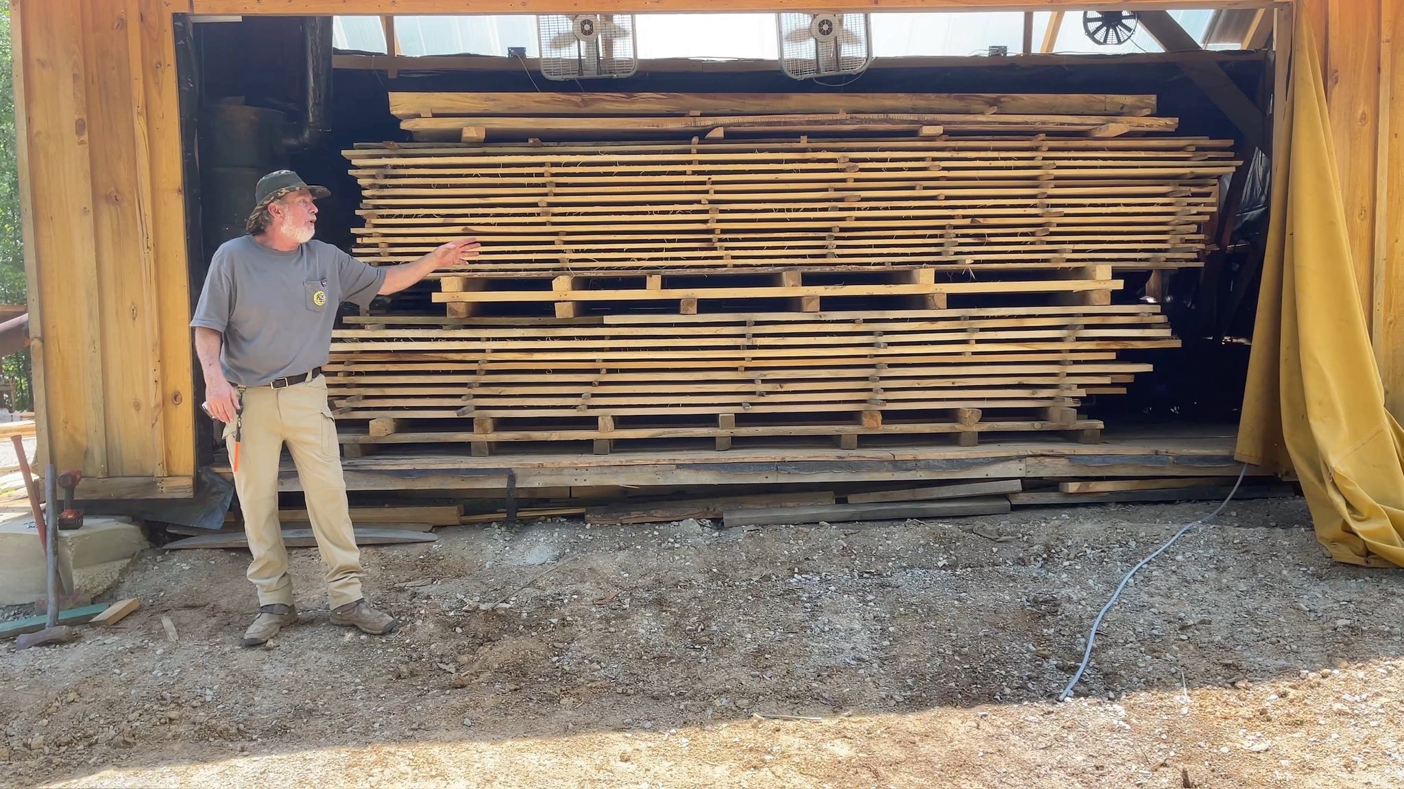 Dan from Two Guys Timberframing showing off his solar kiln.