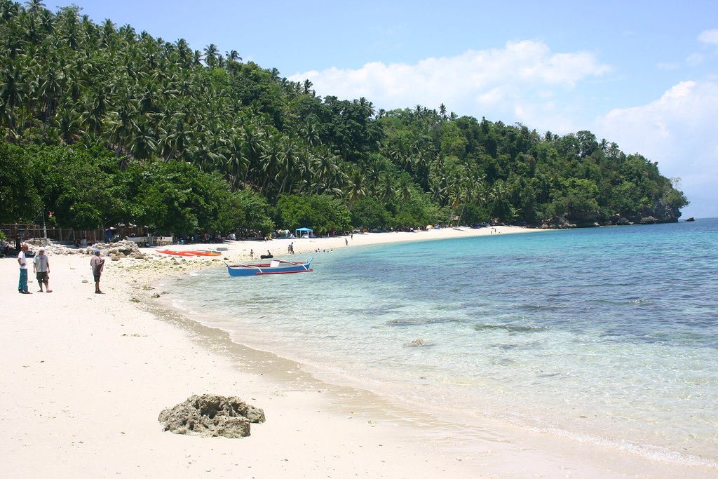  If you're looking for a beach that has peace and quiet in beautiful surroundings and wants a small taste of a preserved tropical dream, Canibad Beach Cove is the best deal for you.