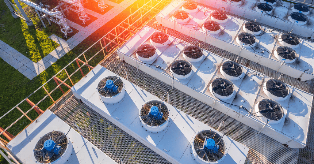Industrial cooling tower fans used in sustainable water management for commercial facilities.