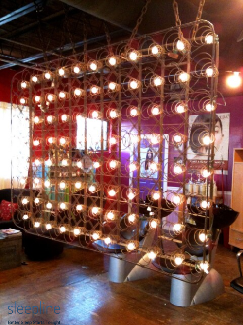 Old mattress spring room divider with lights
