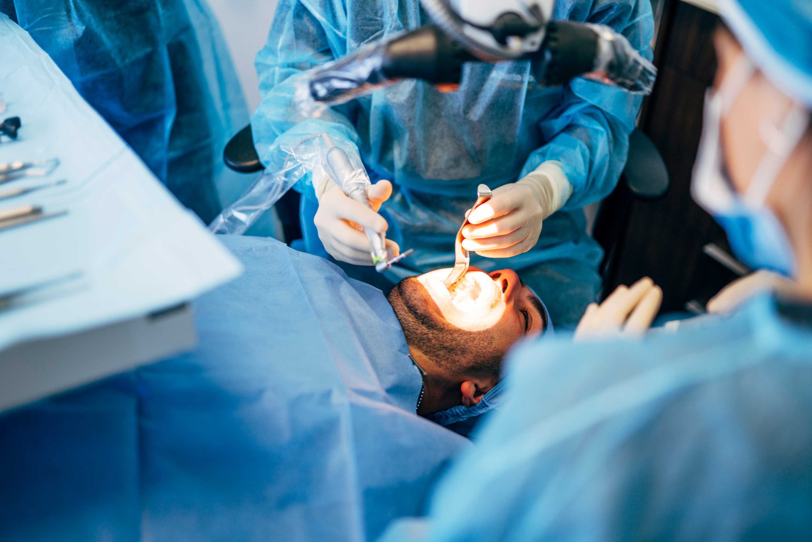 Surgeon performing jaw surgery 