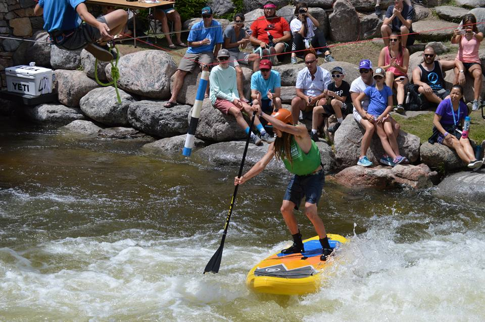 paddle boarding on a river