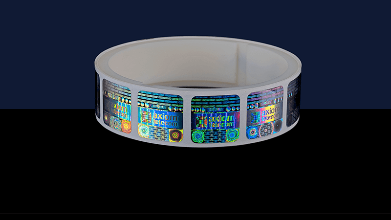 Security labels with branding and holographic patterns