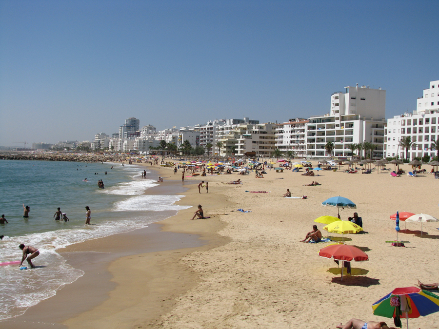 Surfers and other nautical activities in Algarve, Portugal