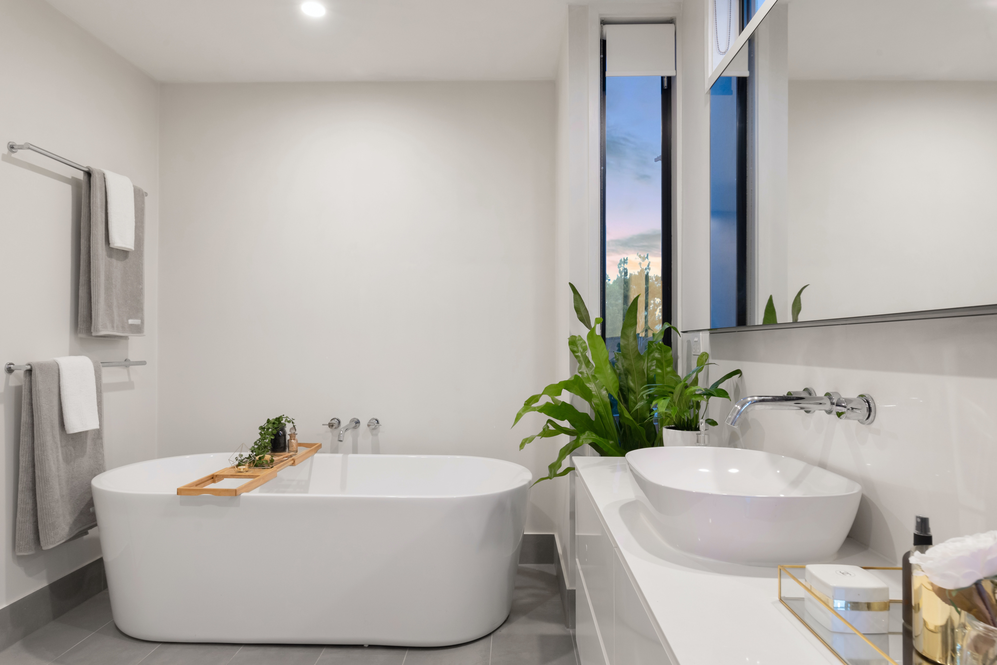 Photo of a Bathroom with white bath tub and white sink