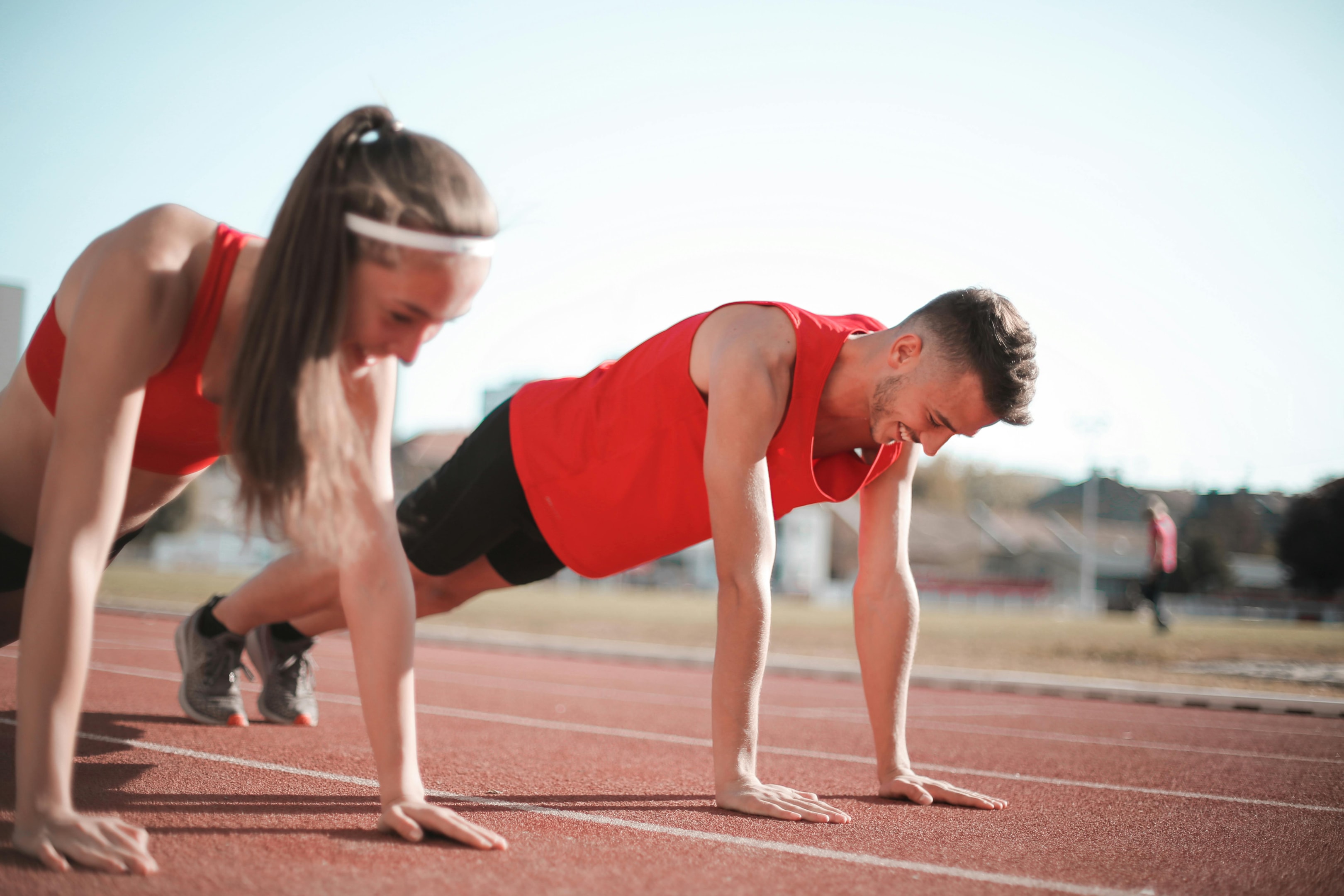 Photo by Andrea Piacquadio: https://www.pexels.com/photo/man-and-woman-in-red-tank-top-and-black-shorts-doing-yoga-3763885/