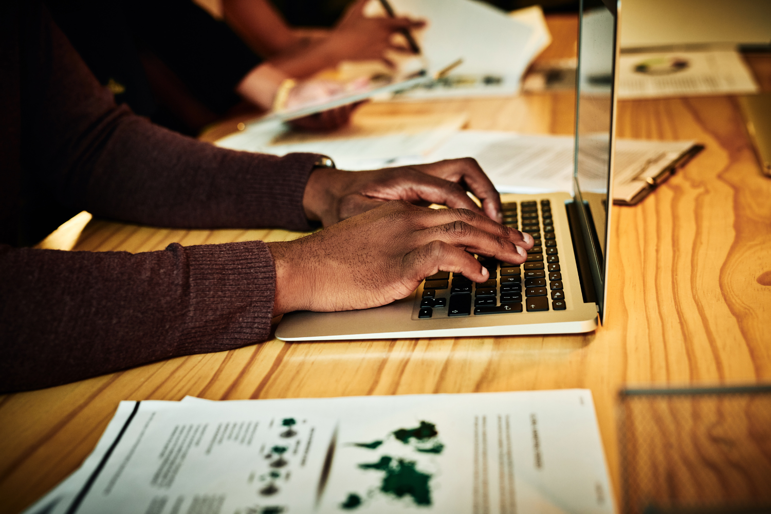 Employee typing an email.
