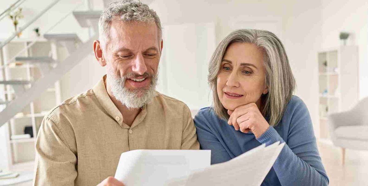 a couple is reviewing their spending