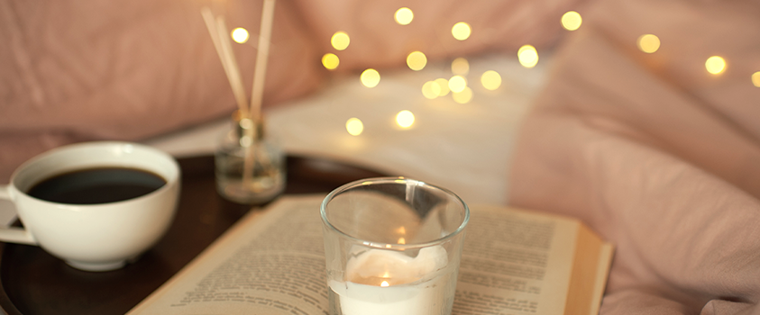 Relax in bed with a hot cup of tea and your favourite scents, whether you use a candle or scented reeds. 
