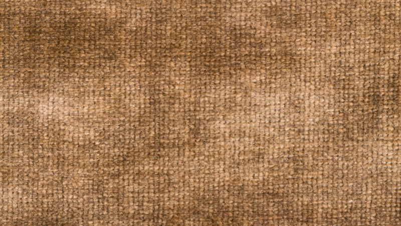 A close up image of an brown colored lyocell fabric