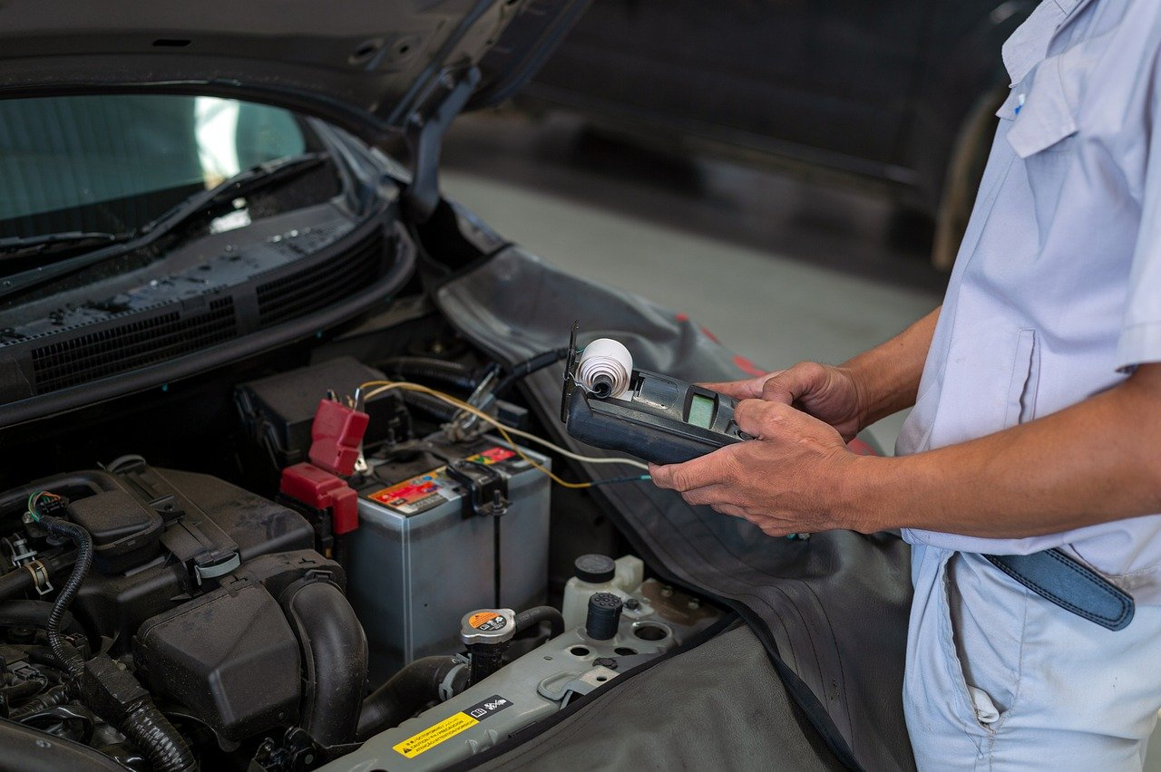 Mechanic testing a car