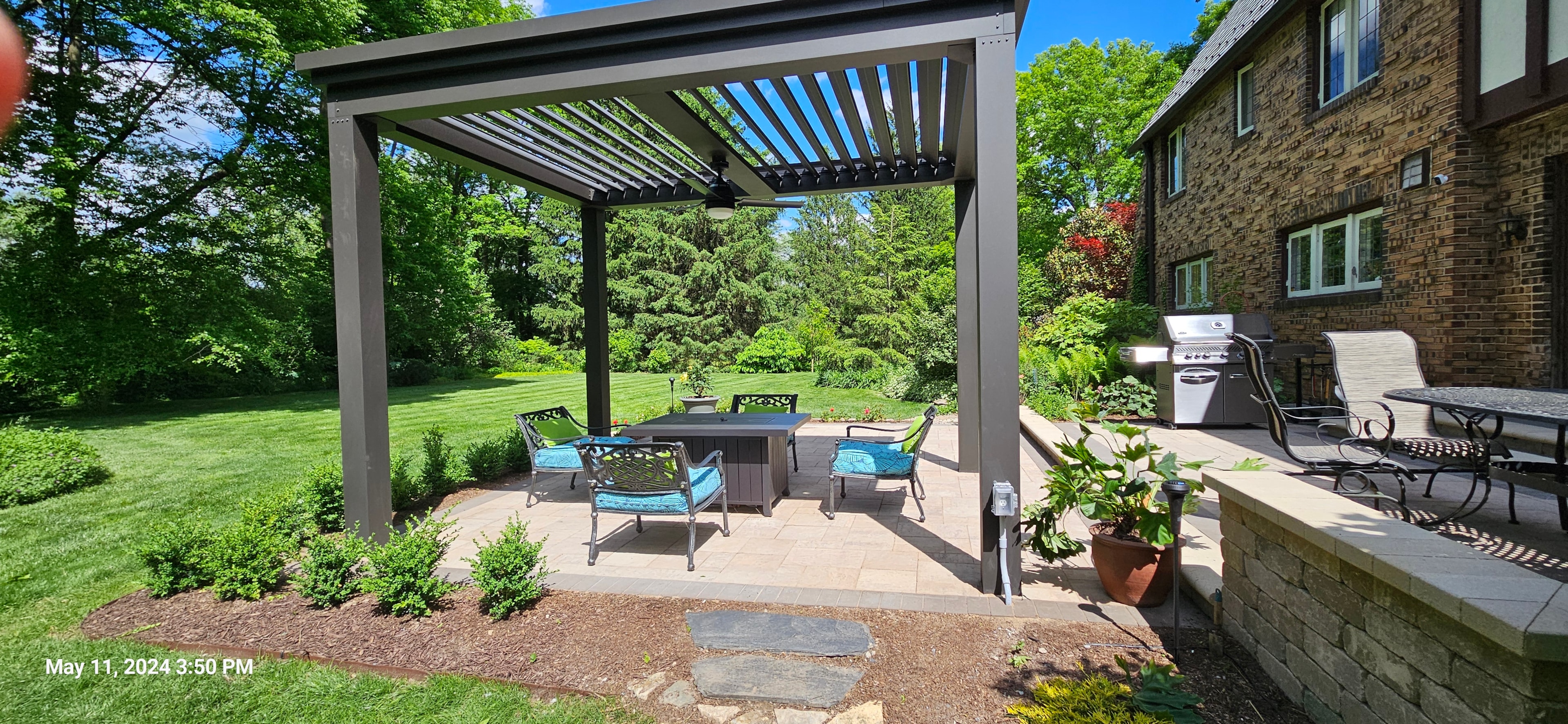 Luxury Pergola structure in backyard creating a beautiful space intertwined perfectly with the current style of home.