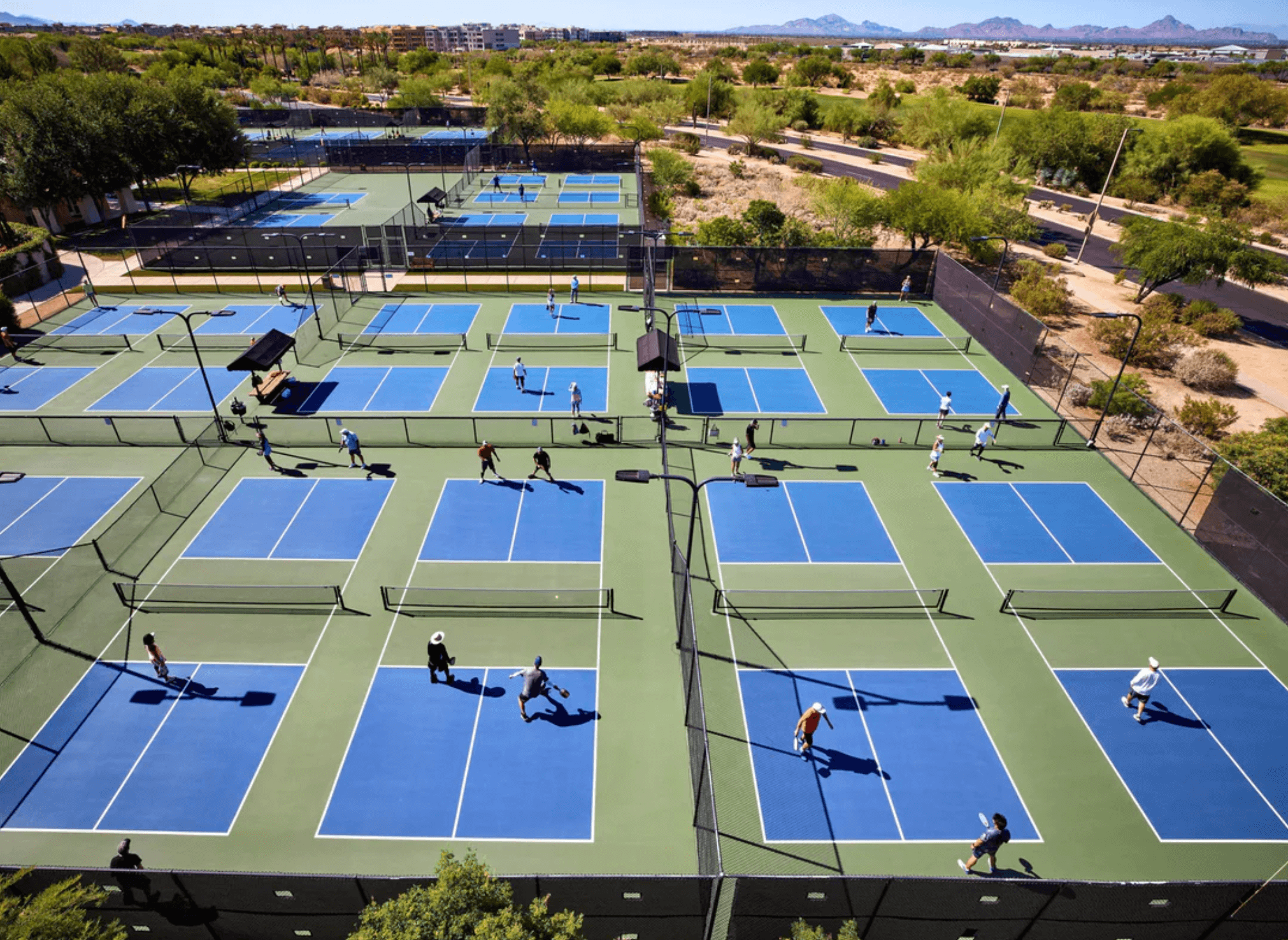 pickleball game on pickleball courts; rent pickleball equipment and balls from their racquet club