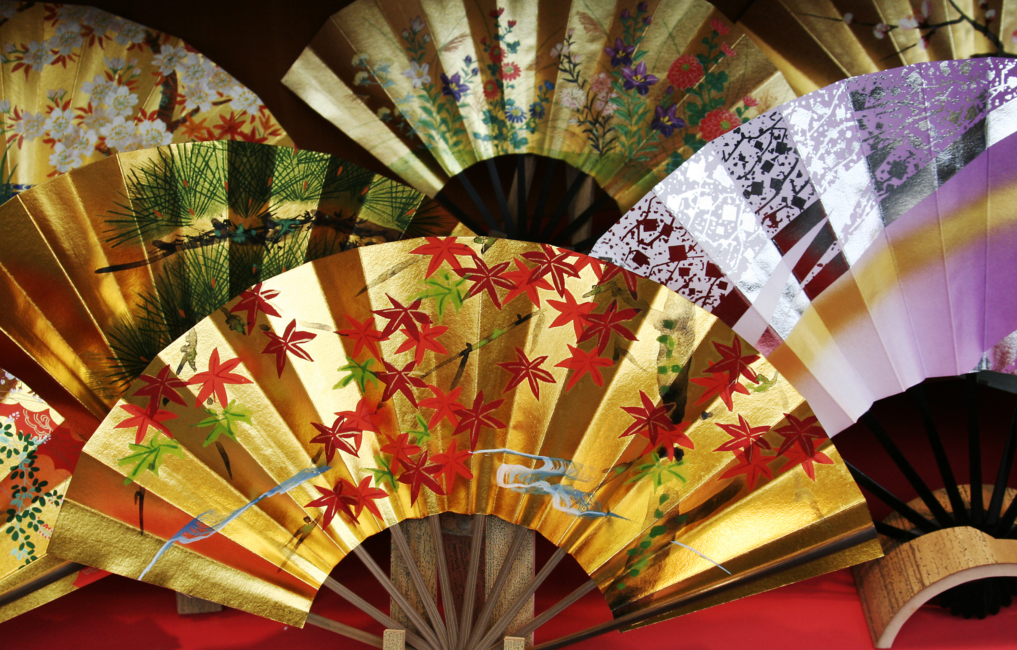 Folding fans with Japanese patterns