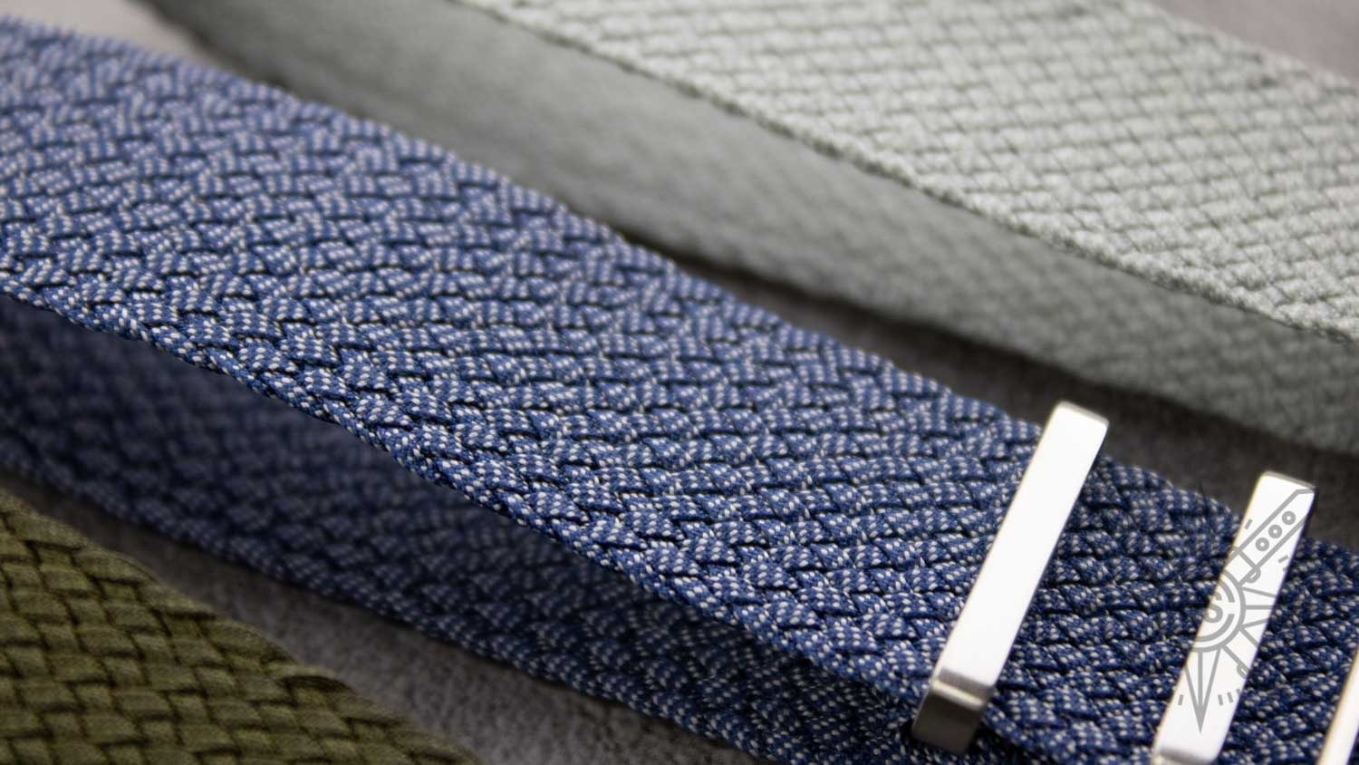 A variety of perlon straps displayed in different colors.