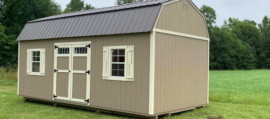 A lofted barn shed in the middle of a yard. source: Canva