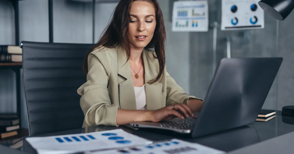 Woman reviewing LLC disregarded entity tax documents for her OnlyFans business to maximize tax benefits.