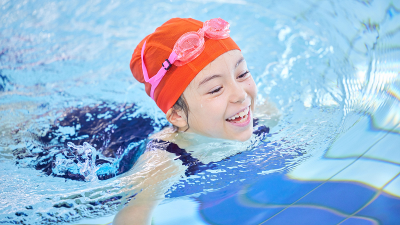 A child is recreationally swimming.