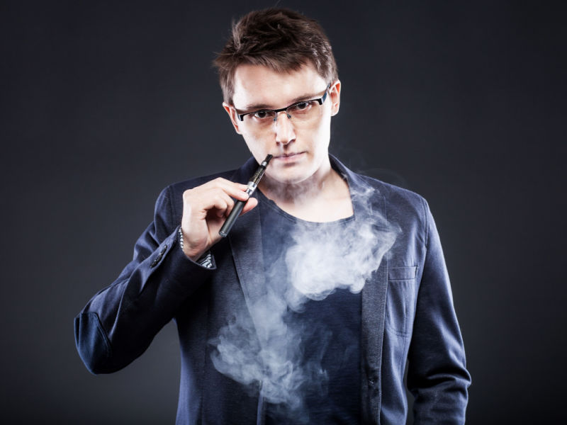 man smoking e cig with Propylene Glycol