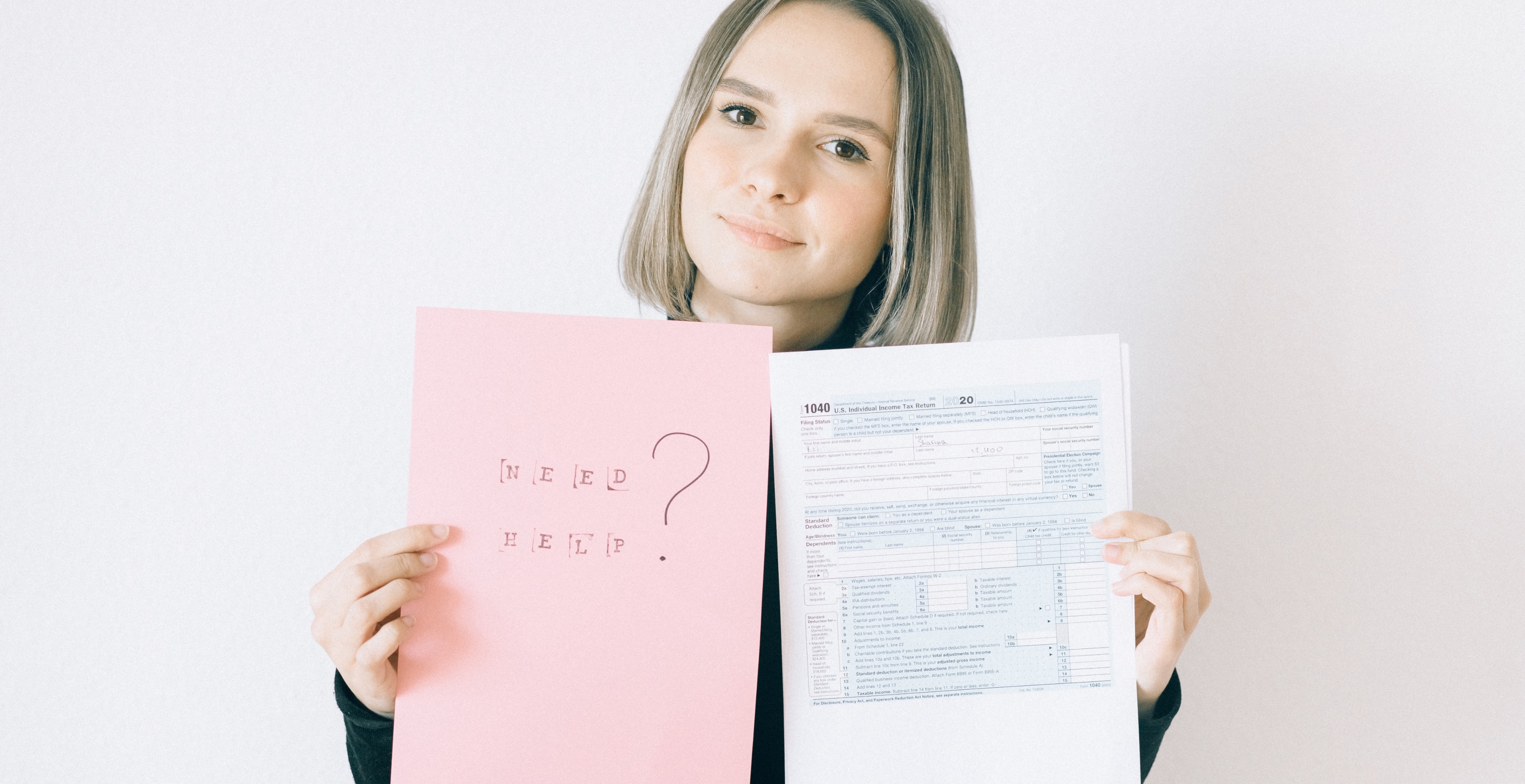 Woman Holding A Pink Paper Offering Service On Onlyfans Tax Forms