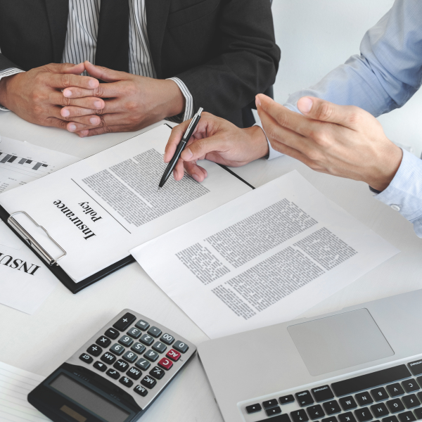 Image showing an attorney reviewing insurance policies.