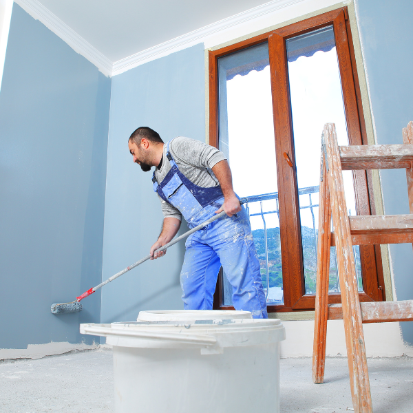 An image showing professional painters working on a home.