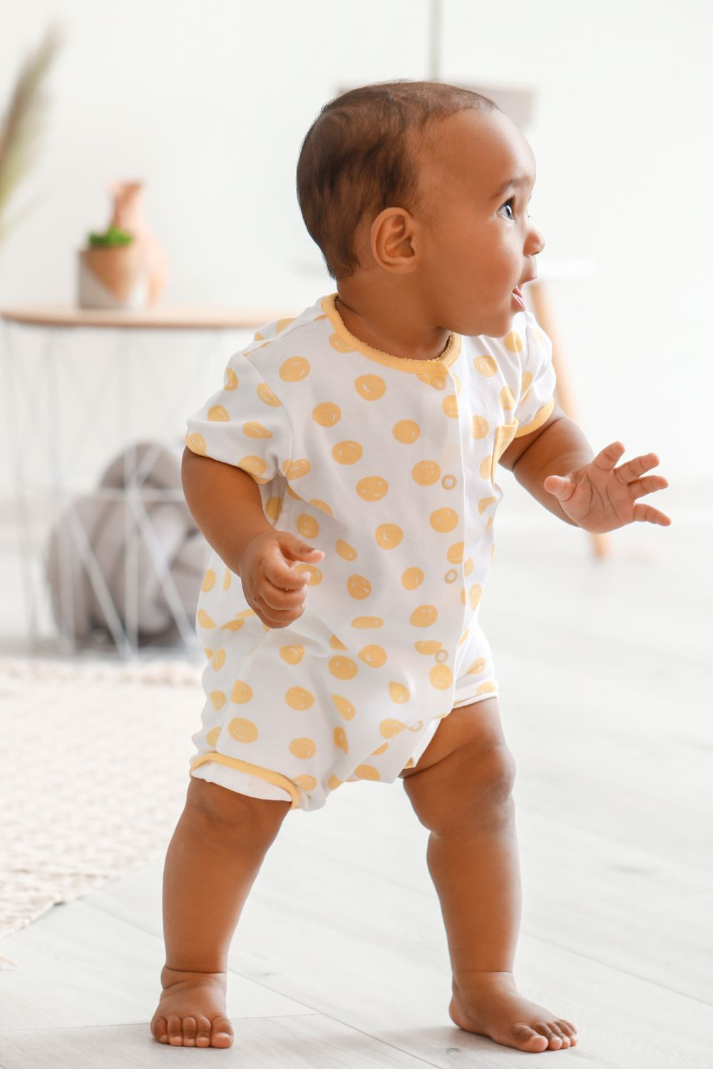 Bbay taking first steps - Featured in What Are The Reasons For Delayed Walking In Babies